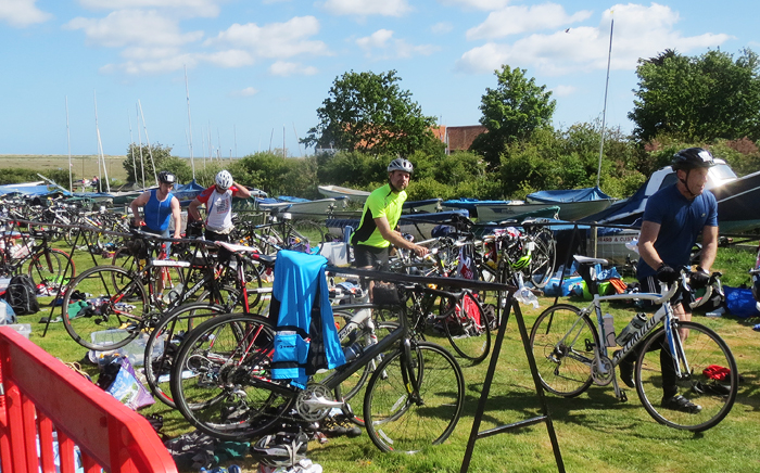 Transition from kayaks to a 45 mile bike race around the lanes and villages