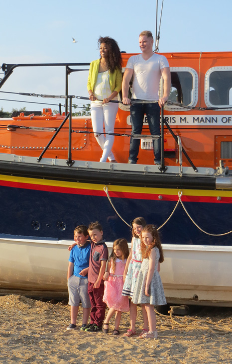 The Royal party posing with the lifeboat
