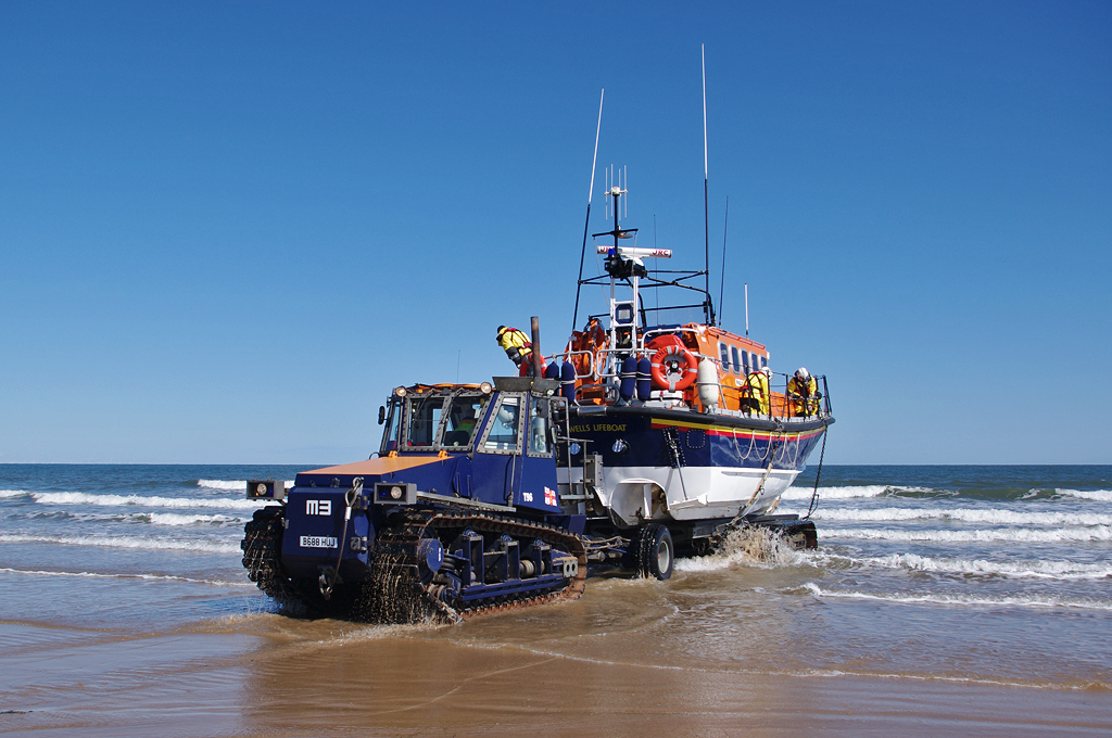 Launching on exercise on Holkham beach, first time out for our new Helly Hansen gear