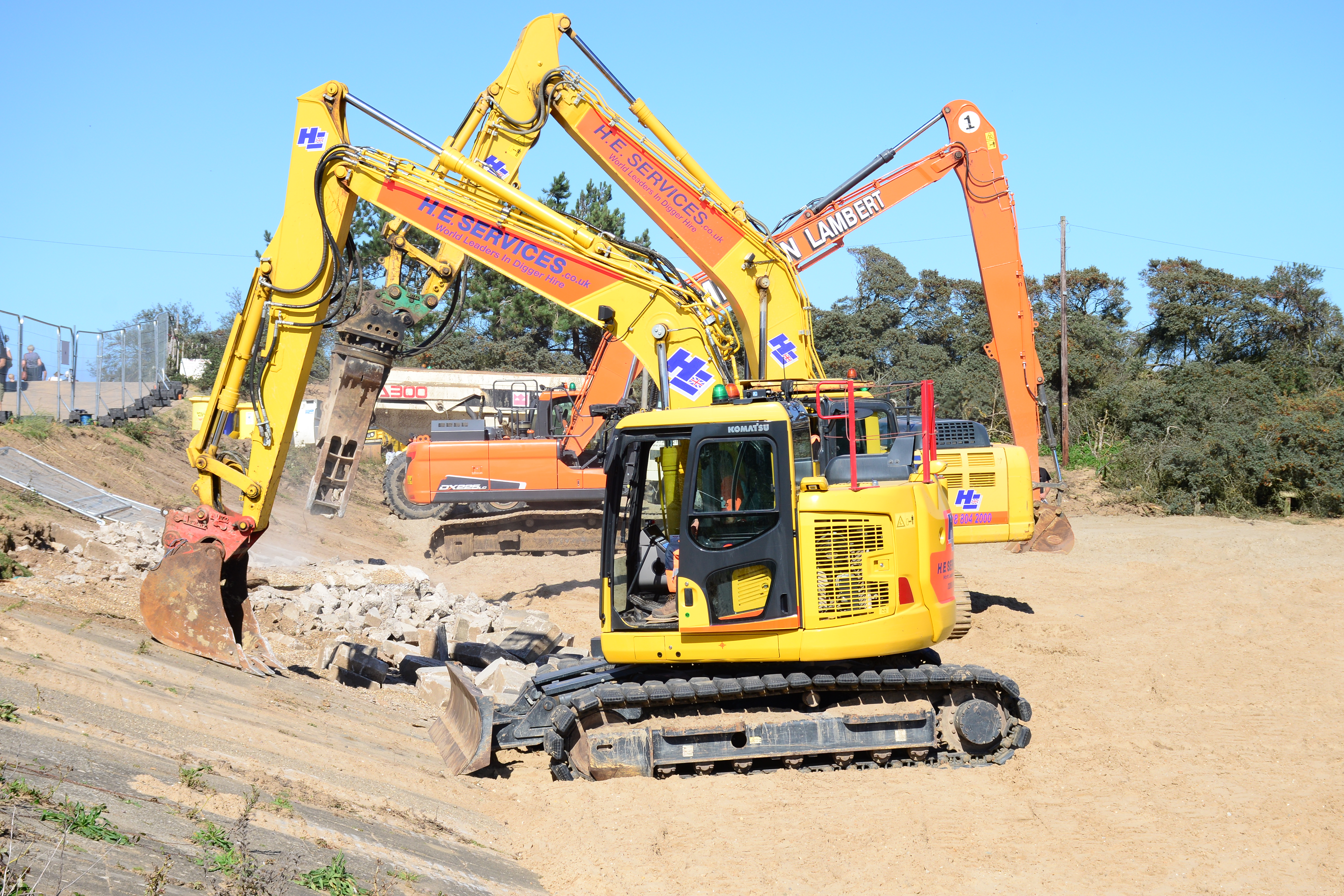 Work begins clearing the site and the base of the beach bank