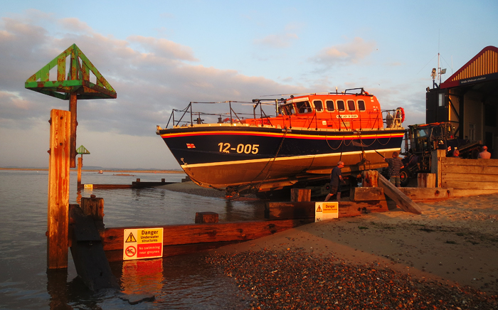 Relief lifeboat 12-005 Lady of Hilbre being washed down and recovered at Wells, 2/7/15