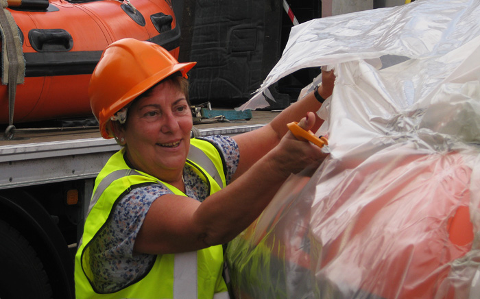 Benefactor Jayne Wilcox does the honours with the new lifeboat