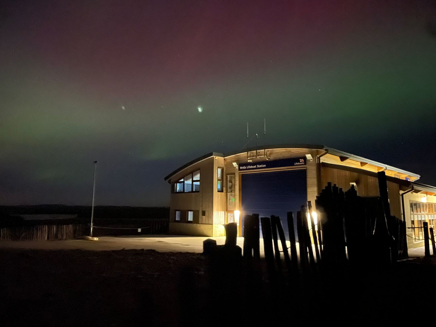 Northern lights above the boathose