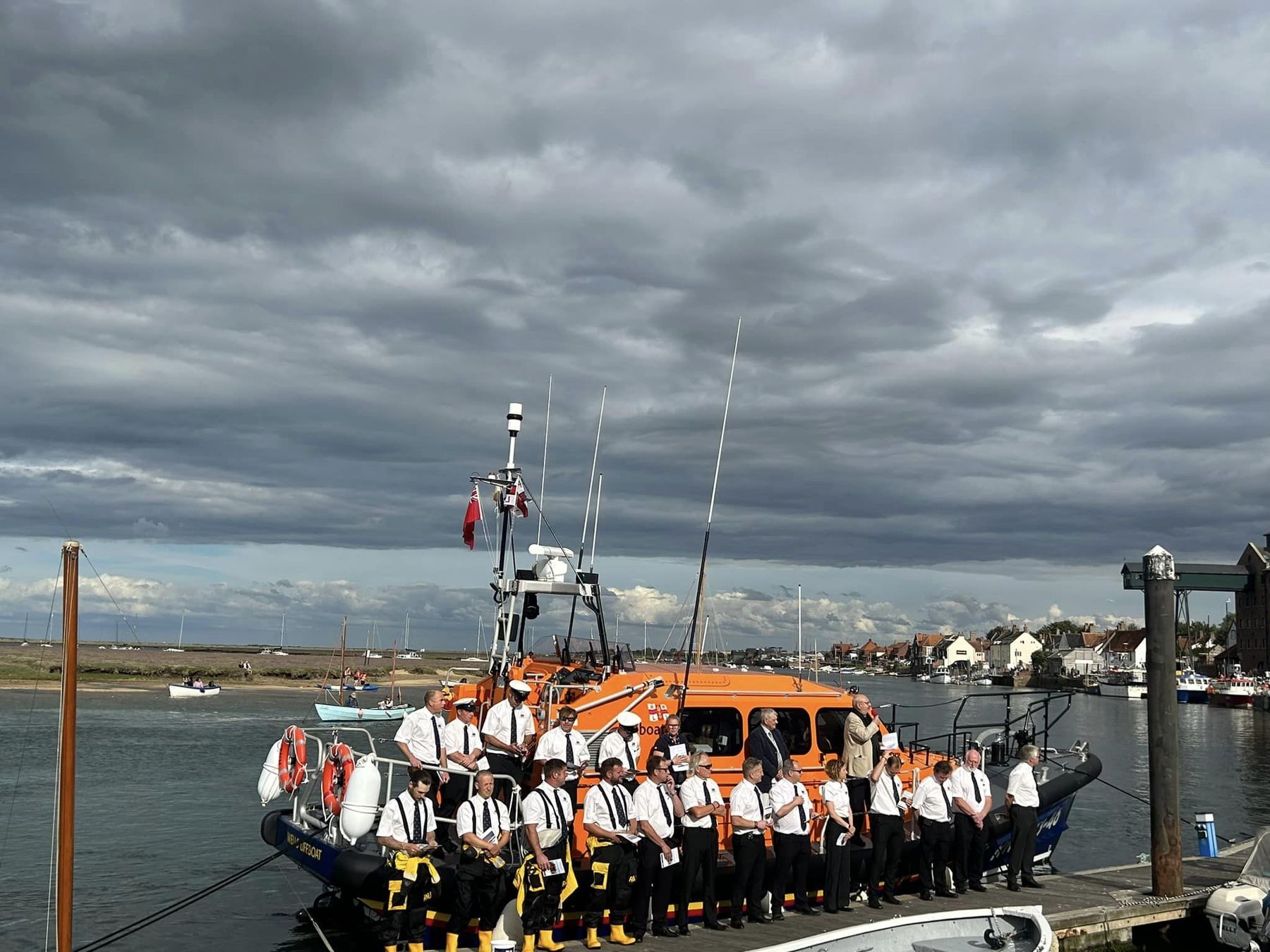 Crew and lifeboat alongside for our annual lifeboat service at the quay