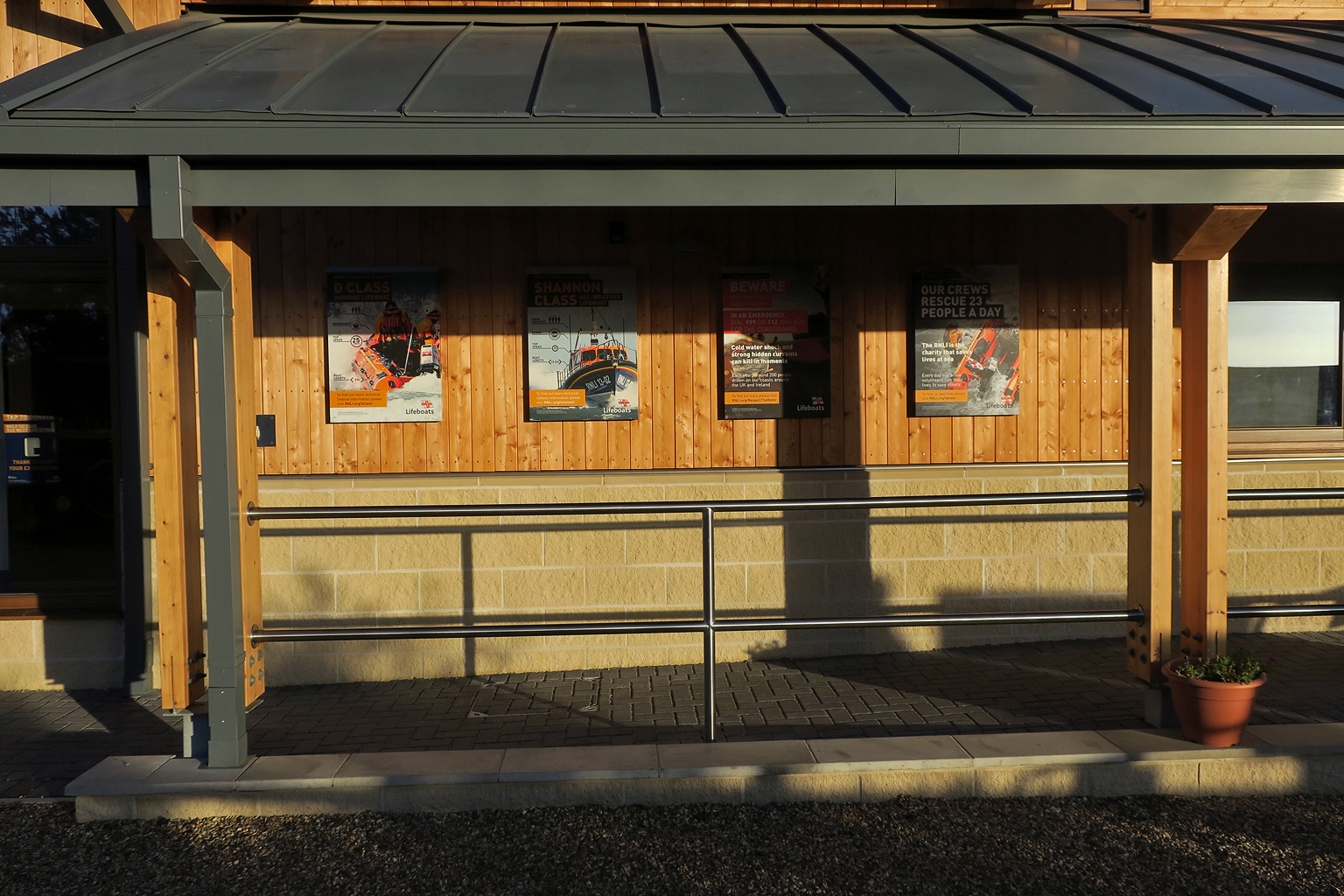 Information posters and ramp to visitor entrance