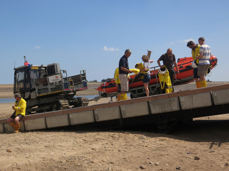 Inshore lifeboat briefly on the new all-weather lifeboat launching ramp during the 'Launch A Memory' event