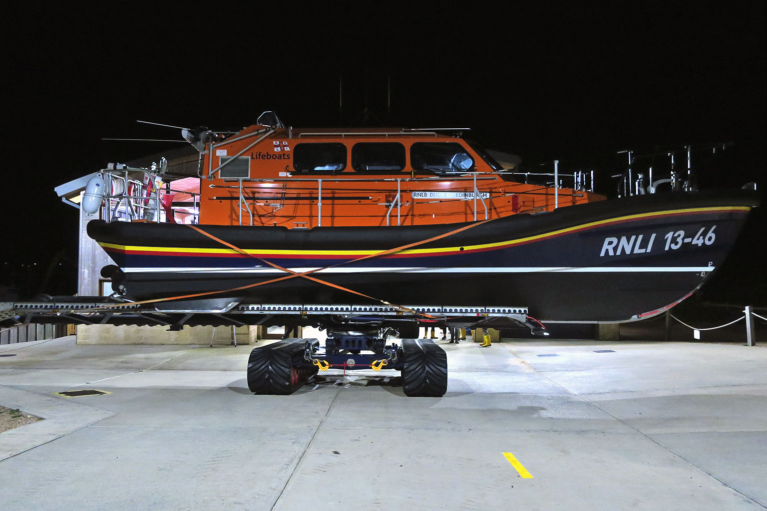 Sideways in front of the boathouse during an inspection on the SLRS carriage