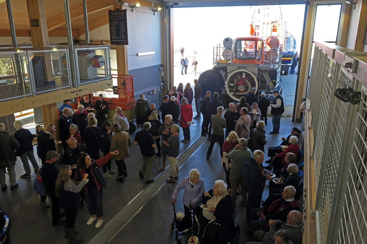 Past and present crew, guild, families, friends and supporters celebrating the new boat and boathouse