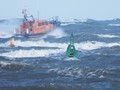 Heading out past the harbour entrance in big waves