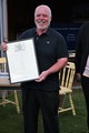 Mick Frary with long service certificate marking over 40 years service on the lifeboat as crew, navigator and mechanic