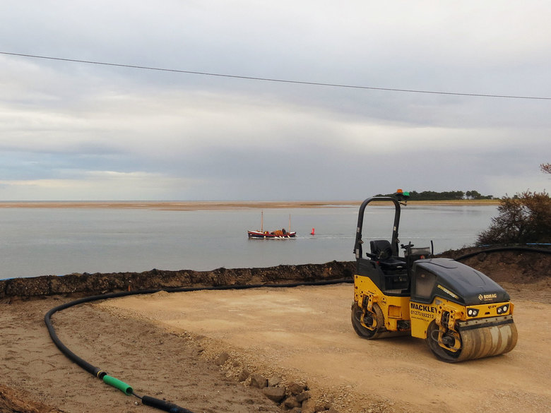 Restored Liverpool-class lifeboat 'Lucy Lavers' passing the gap in the sea defences where the ALB ramp will be