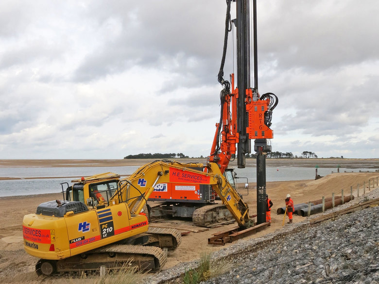 First pile for the ramp being driven into the beach