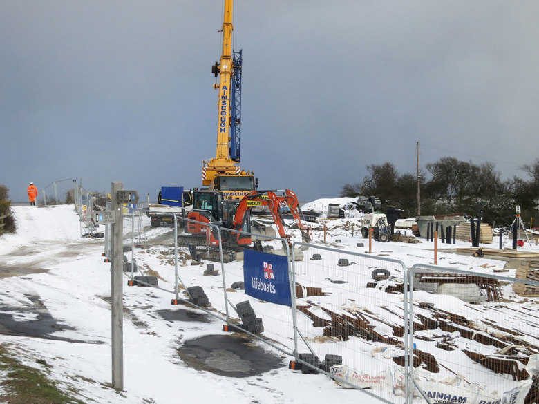 A frozen and snow covered site with work still on-going