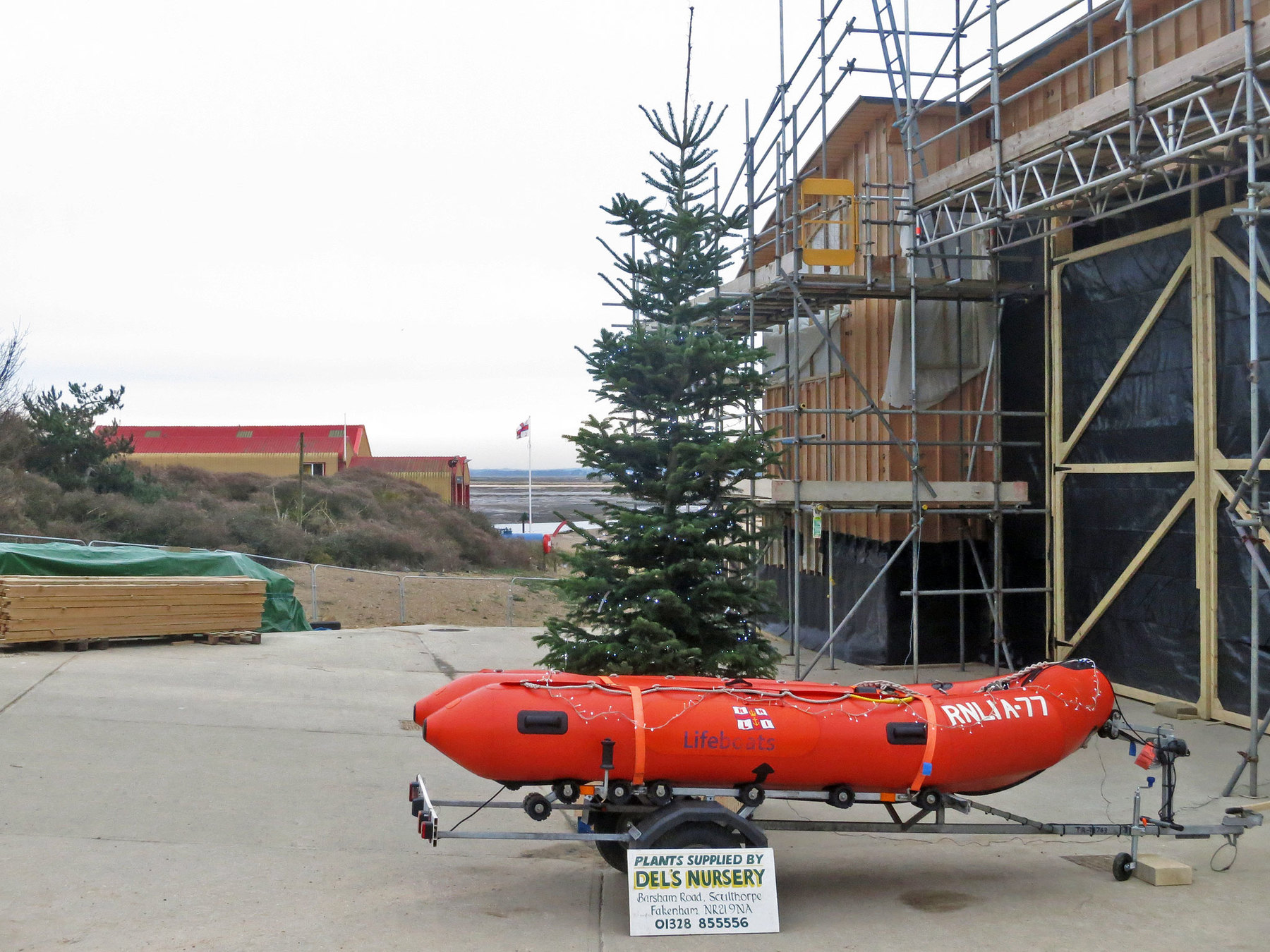 Tree and decorative Arancia-class lifeboat set up for Christmas