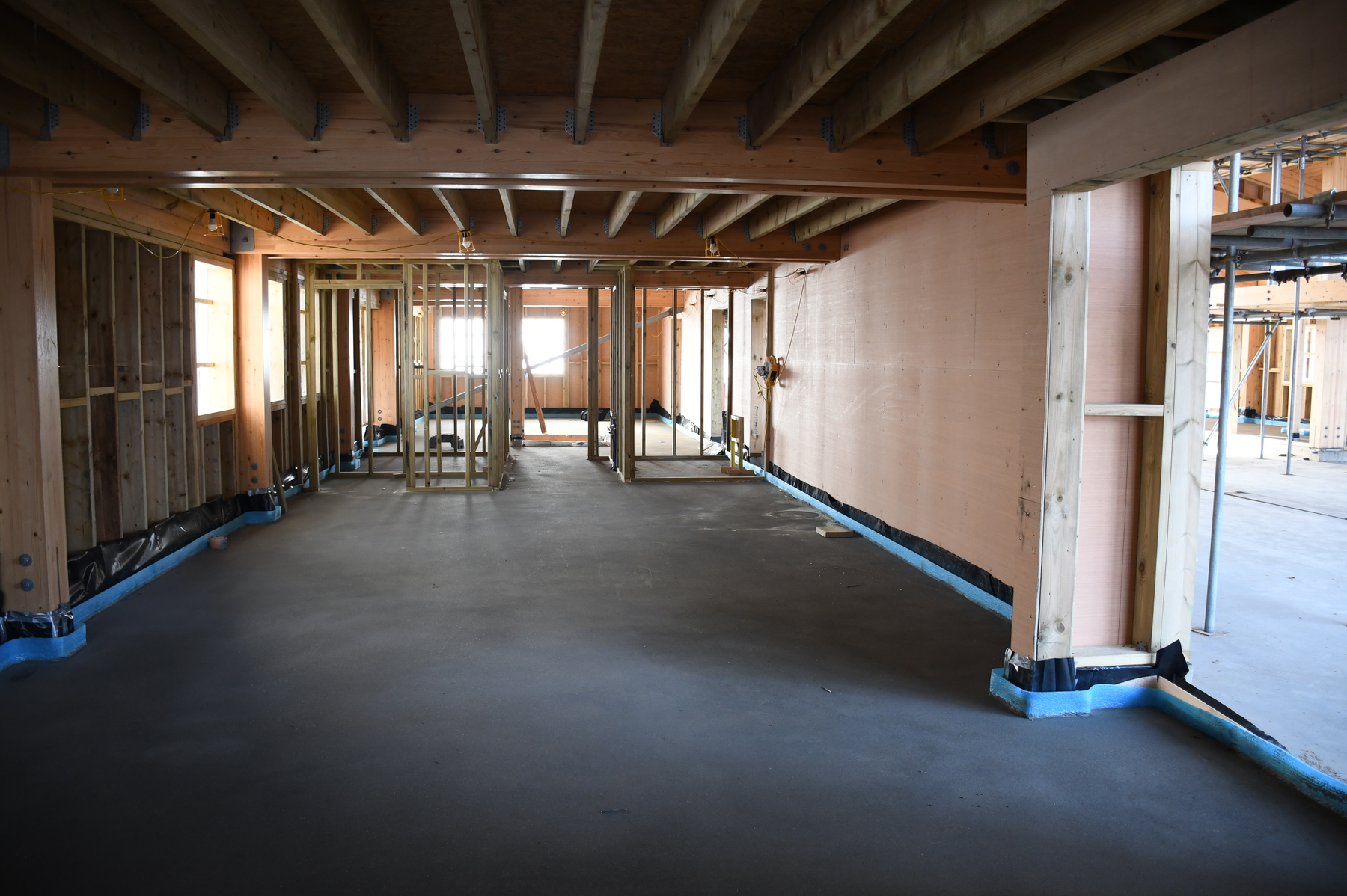 Screed floor in place in the crew changing and workshop side of the building