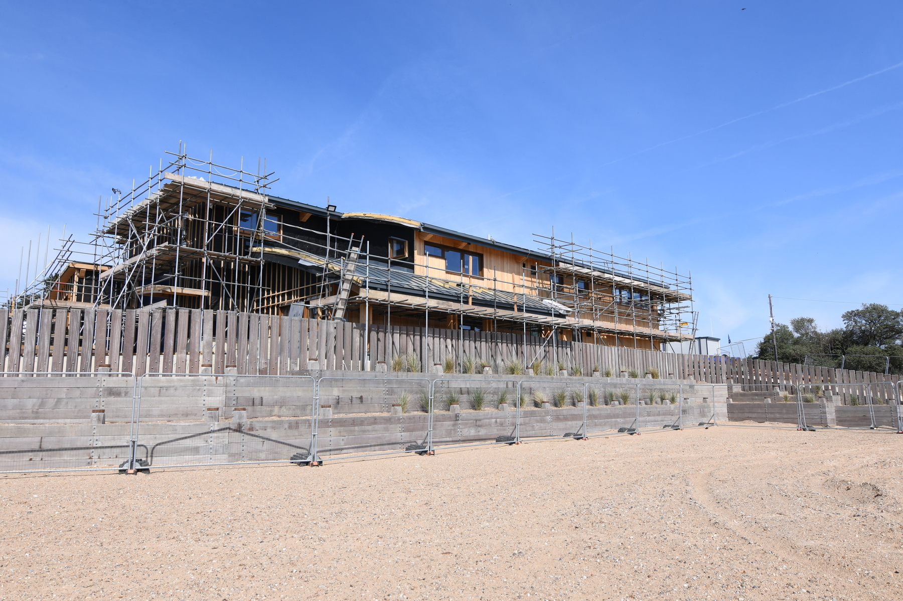 Larch cladding being added on eastern side