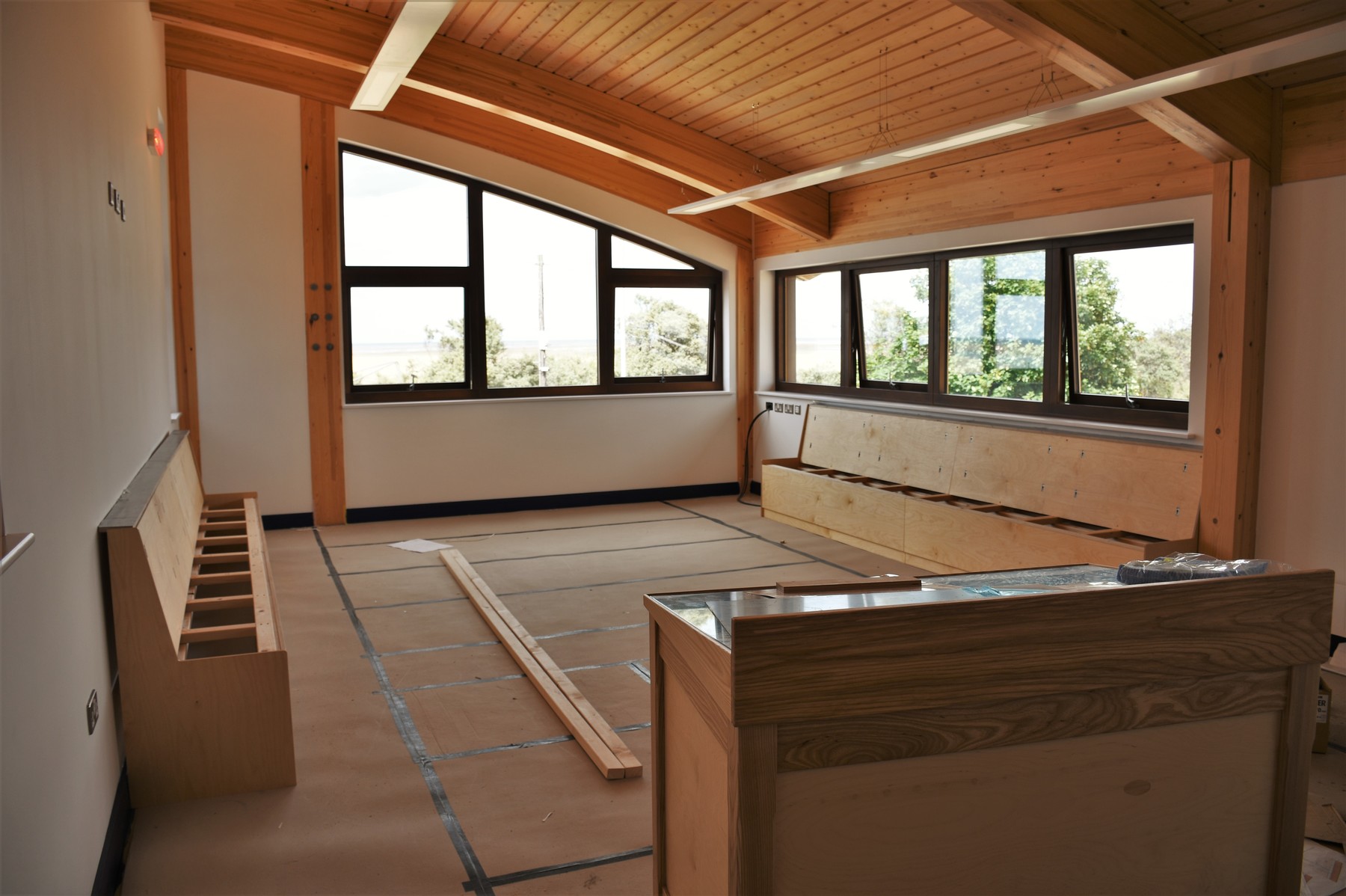 Crew room with bench seating being installed