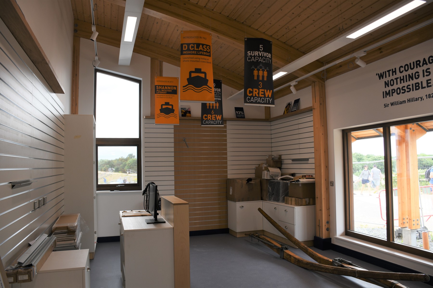 Shop area being fitted out (plus historic righting poles moved from the old boathouse)