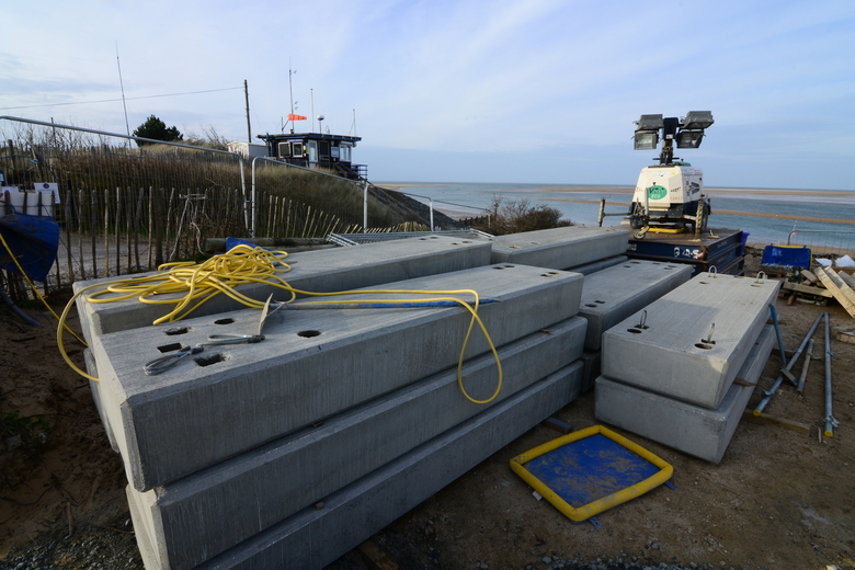 FIrst few concrete slabs for the surface of the ALB ramp delivered to site