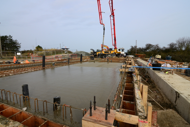 Freshly poured concrete on the eastern side of the building slab