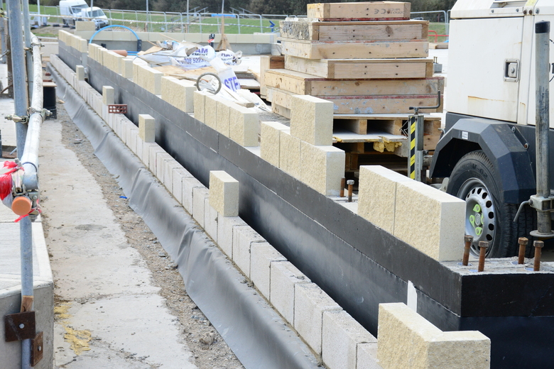 Damp proof course and block work being installed