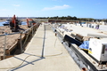 Concrete path completed along the eastern side of the building