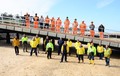 Lifeboat crew and Mackley construction crew on the newly built launching ramp