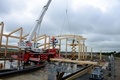 Craning the main boat hall roof beams into place