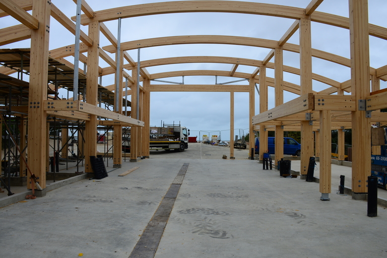 Scaffolding on the west side of the building with frame for public viewing gallery visible on left