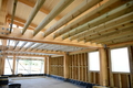 Plywood walls on the changing room and floor joists added above for the first floor crew room