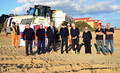 Crew members and station officials, past and present, on the beach at the start of building work