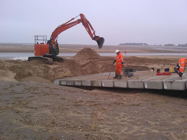 Final precast concrete planks being installed at the foot of the ALB ramp