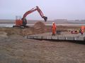 Final precast concrete planks being installed at the foot of the ALB ramp