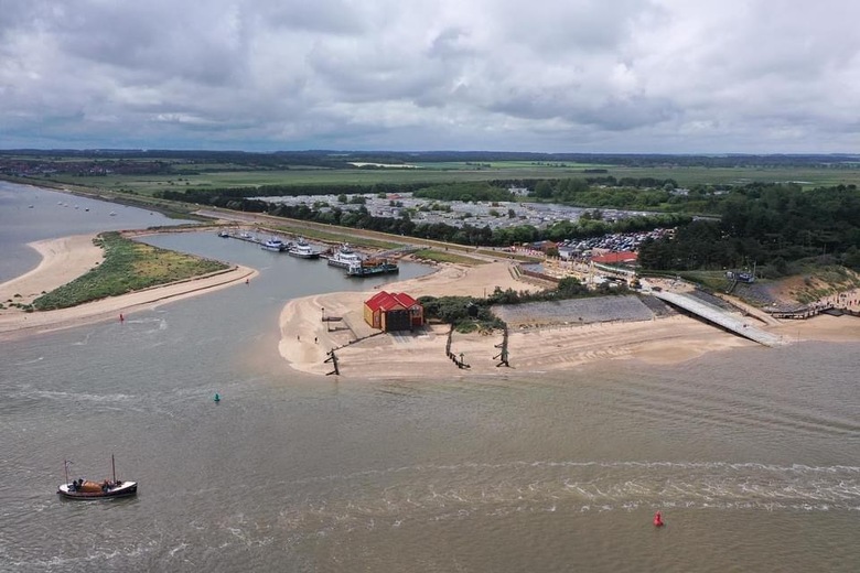 Aerial view, restored historic lifeboat 'Lucy Lavers' on a trip round the harbour