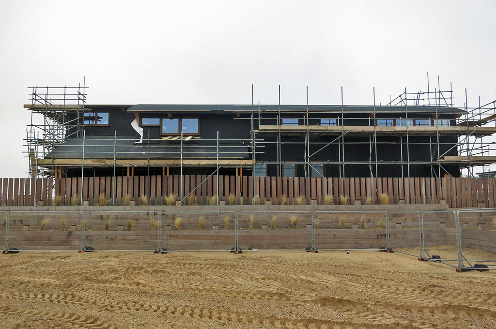 View from the beach with windows and thermal insulation layer