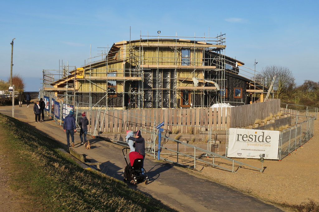 Insulation layers being added to the building