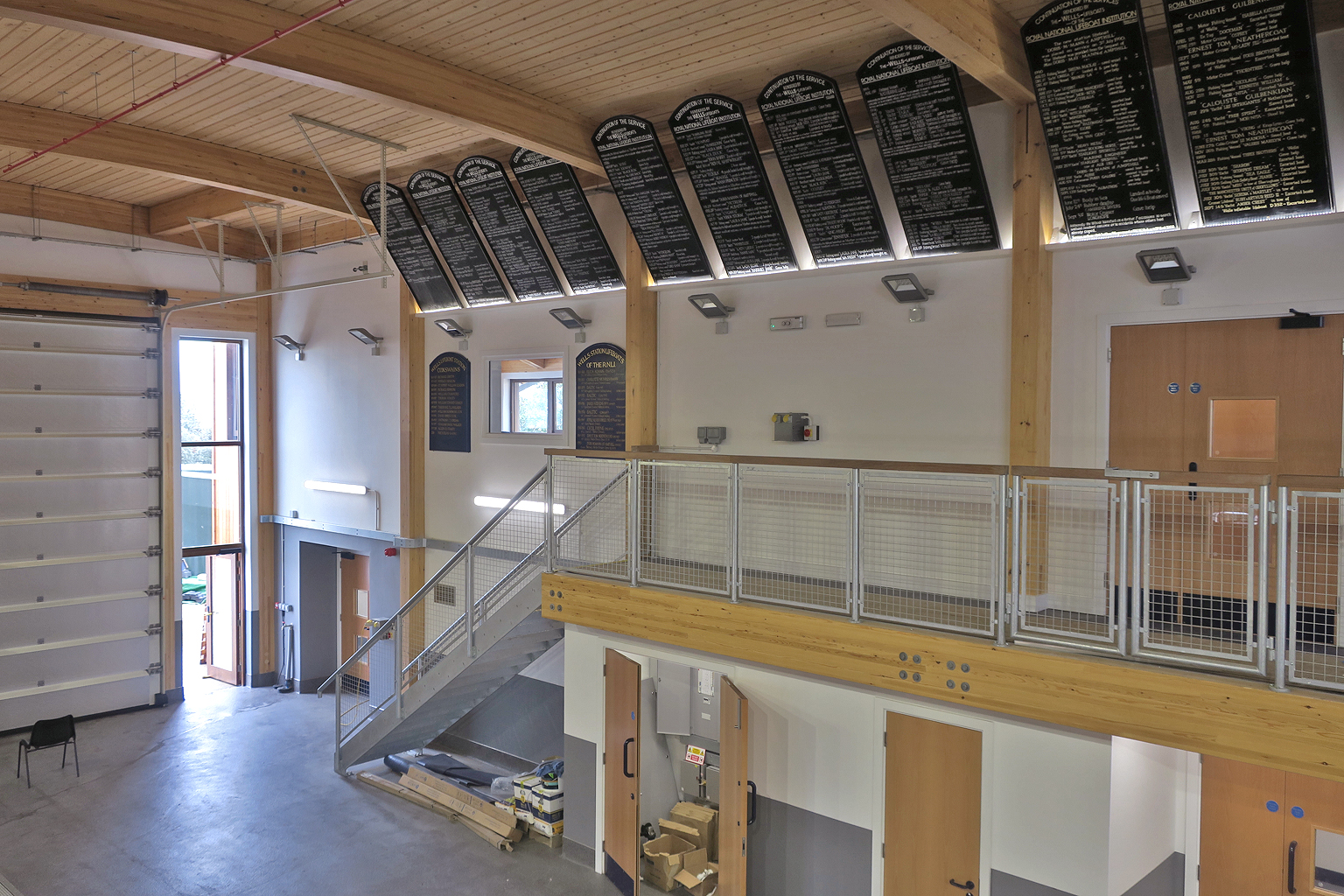 Historic service boards moved from the current boathouse and installed above the crew boarding platform