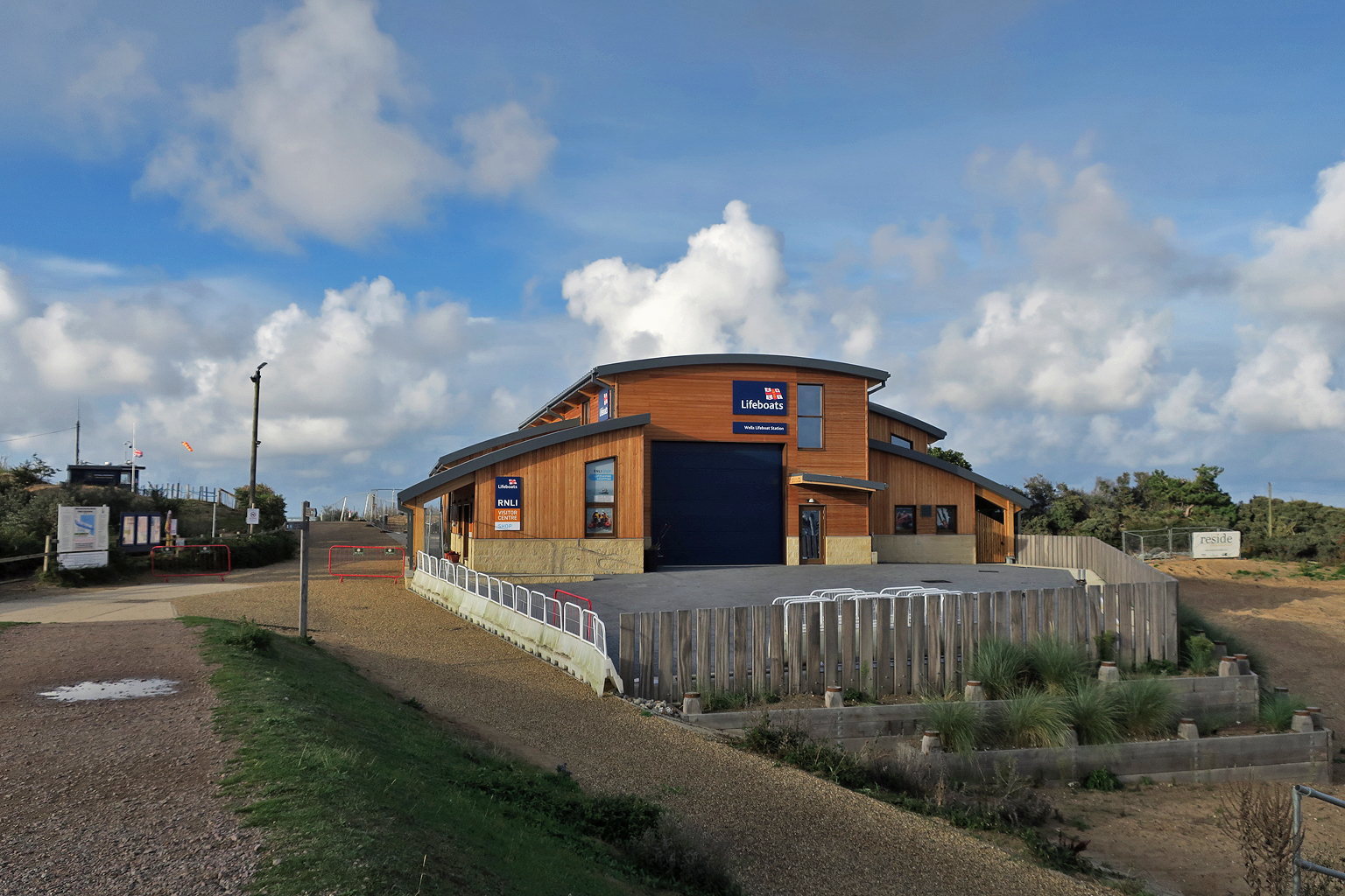 View from the south with resurfaced path and gates added to the path down the eastern side of the building