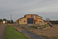 View from the south with completed south apron, Mersey lifeboat beside the new building