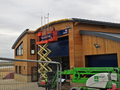 Aerials and masts going up above the main door