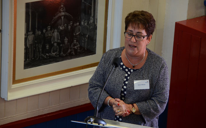 Jayne Wilcox hands over the lifeboat to the RNLI on behalf of Peter Wilcox