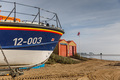 Mersey on the back beach with the old boathouse