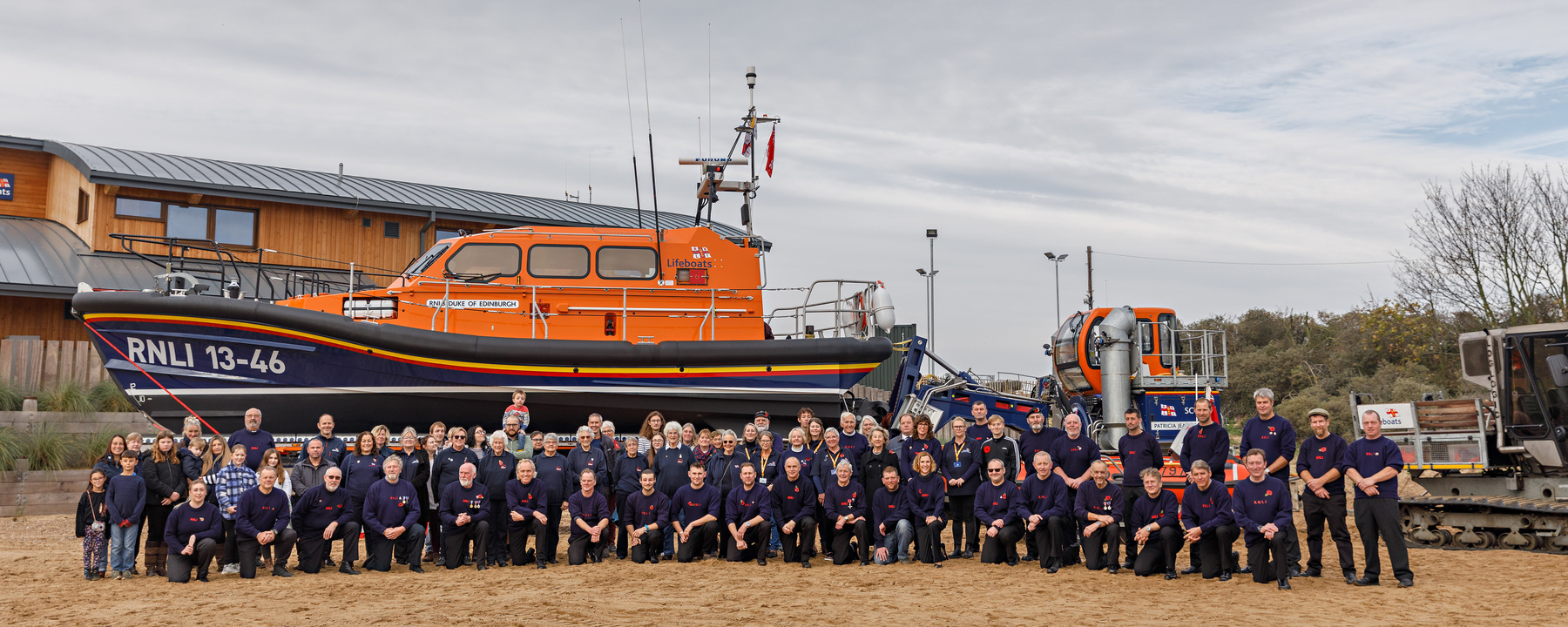 Everyone with the new era of Wells lifeboat;Shannon-class 'Duke of Edinburgh' and the new boathouse