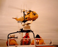 Air Sea Rescue Sea King with Wells Lifeboat. Second Coxswain Bob Smith at the helm.