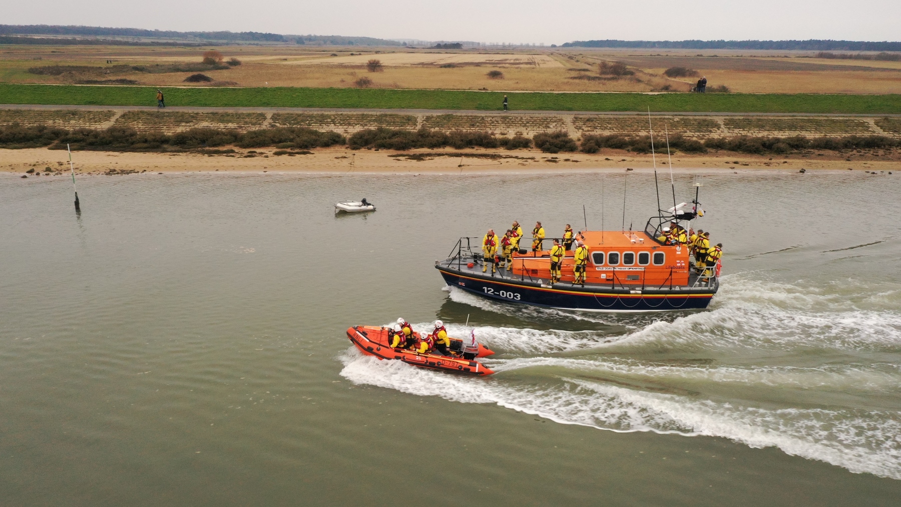 Mersey-class and inshore lifeboat running up to the quay
