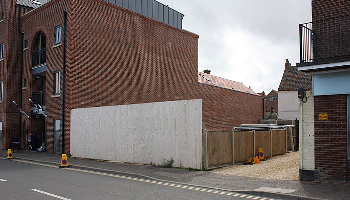 The site for the new painting on the quayside, fronting land left bare by a fire in 2005