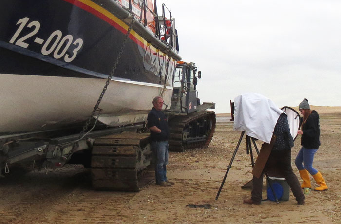 Jack Lowe setting up for a portrait of the coxswain