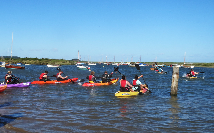 Superhero 2015 - start of 4 mile kayak leg leaving Burnham Overy Staithe