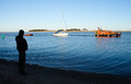 The skipper of 'Colchis' watching both lifeboats bringing his yacht safely back into Wells, 6/3/20