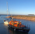 'Colchis' arriving back in the outer harbour under tow of the all-weather lifeboat, 6/3/20